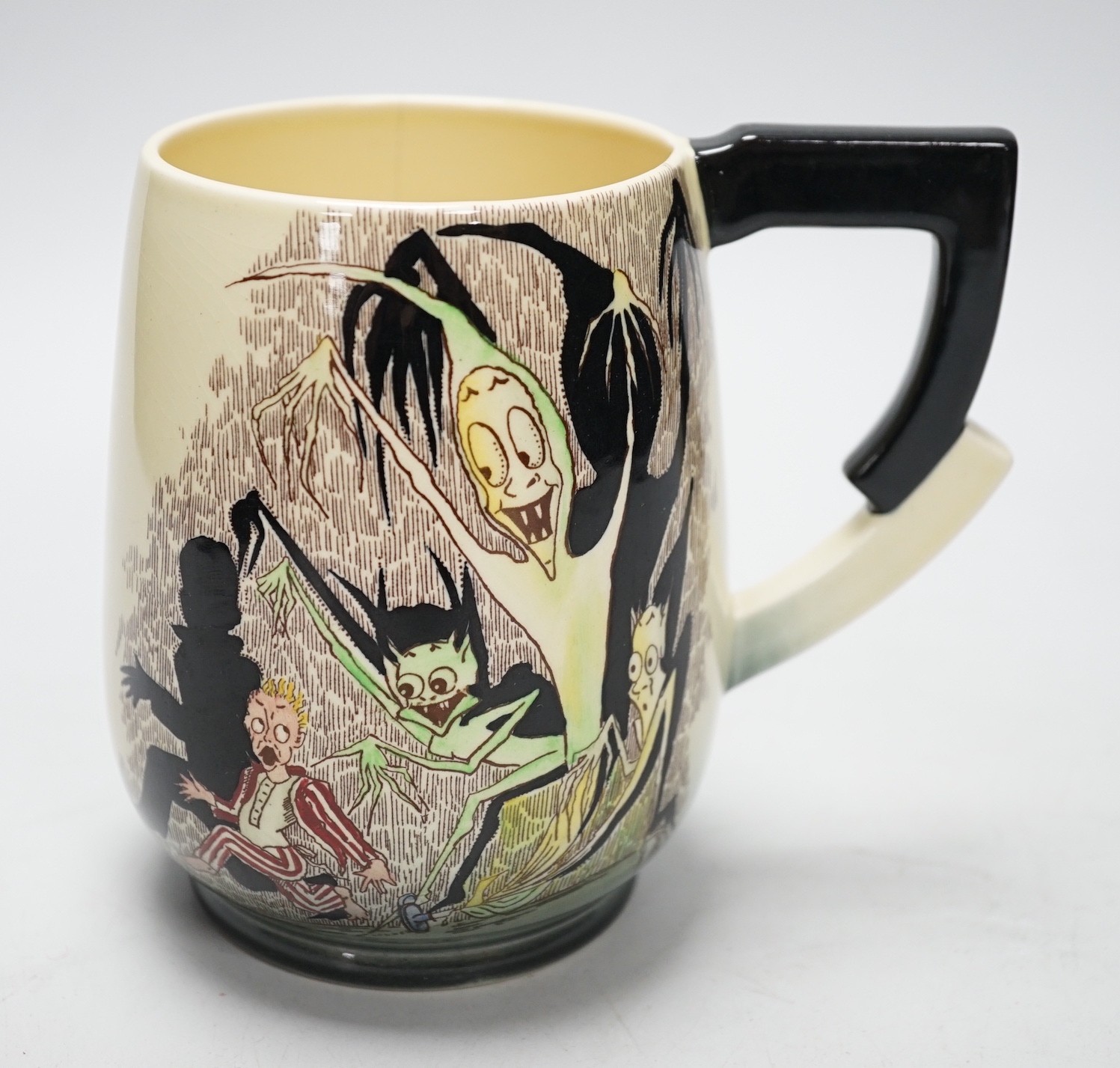 An unusual Carlton Ware, ‘Devon Litany’ tankard, 12cms high